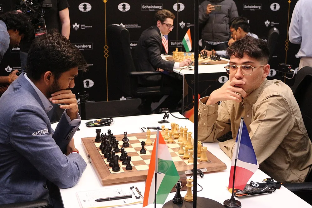 Gukesh Dommaraju and Alireza Firouzja at the 2024 Candidates Tournament.