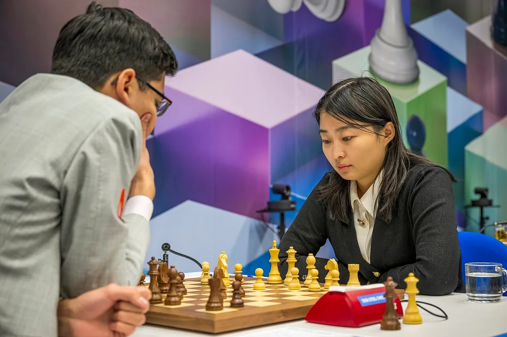 Ju Wenjun playing Anish Giri at the Tata Steel Chess Tournament.