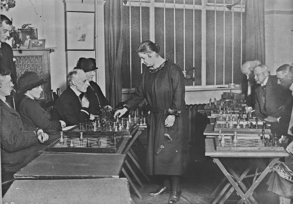 Vera Menchik giving a simultaneous exhibition in London in 1926.